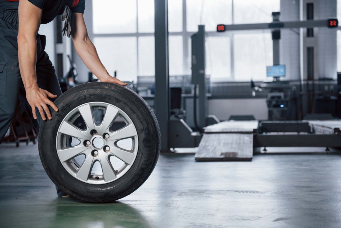 Photo of a used tire and wheel